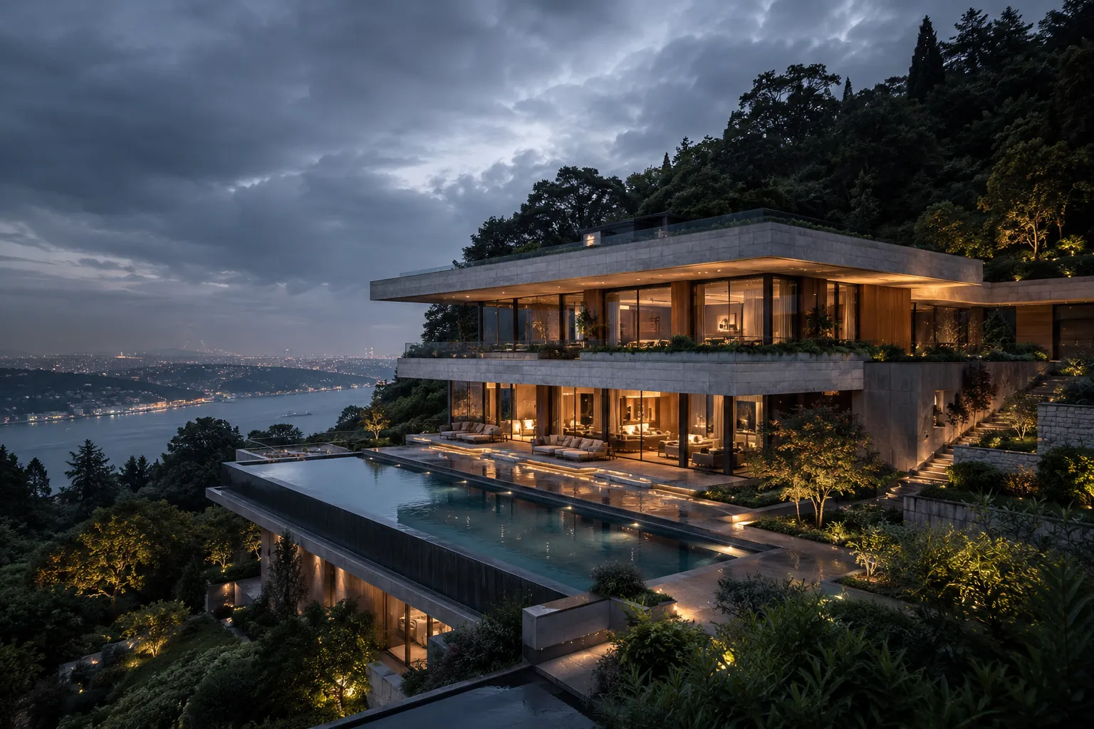 The Bosphorus Residence at dusk, a layered concrete villa built into a wooded hillside above the Bosphorus with a lit infinity pool.